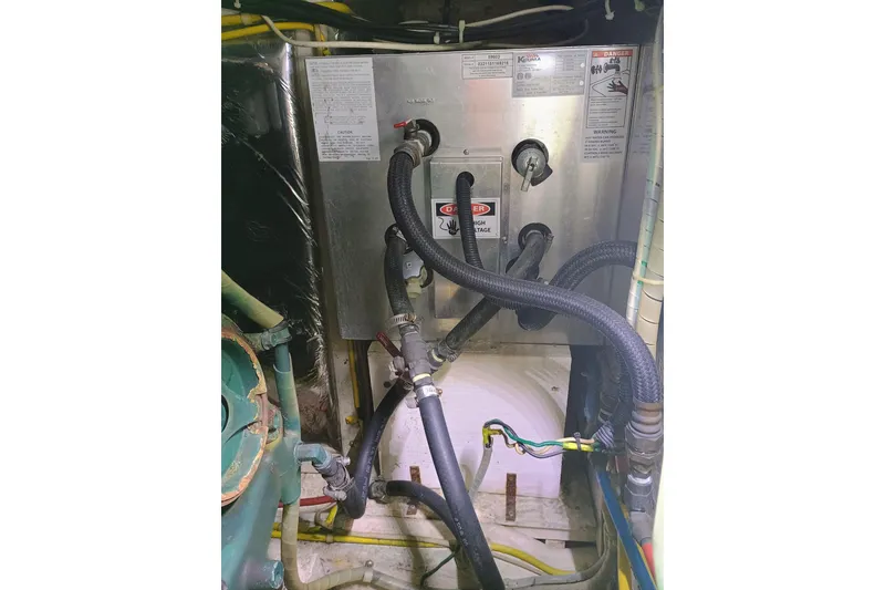 Slide: The Image of Engine room of 1988 Vantare 46' Aft Cabin Wide Body MY with wiring and components. - 59