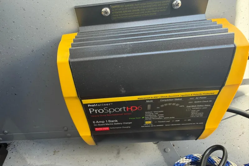 Slide: The Image of ProMariner ProSport HD6 marine battery charger in a 2013 Lund 1600 Fury Tiller boat. - 19
