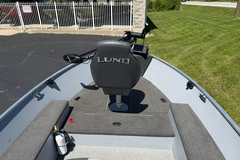 Slide: The Image of 2013 Lund 1600 Fury Tiller boat interior with seat and control panel. - 7