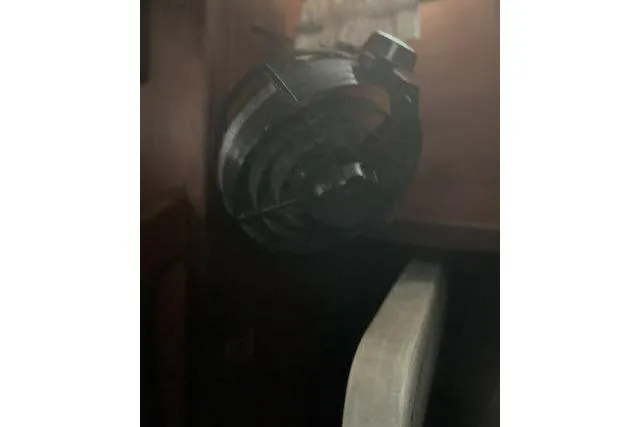 Slide: The Image of Interior of 1977 Uniflite Valiant 40 yacht with a mounted fan. - 22