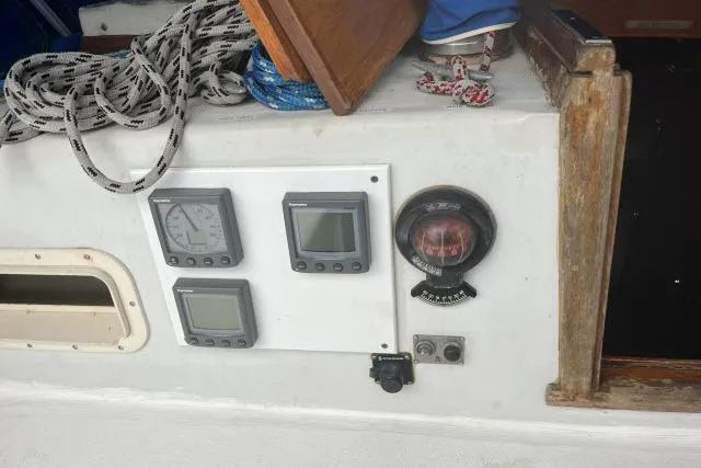 Slide: The Image of Control panel on a 1977 Uniflite Valiant 40 sailboat with navigation instruments. - 31