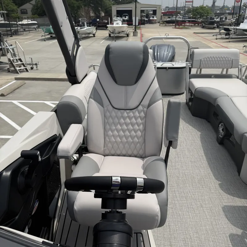 Slide: The Image of Luxurious seating in Avalon QLS25T Excalibur 2026 boat. - 16