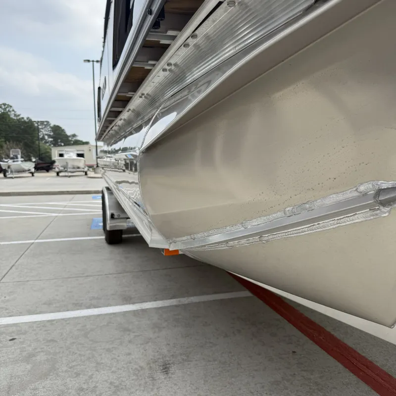 Slide: The Image of Close-up of Avalon QLS25T Excalibur 2026 boat hull. - 36