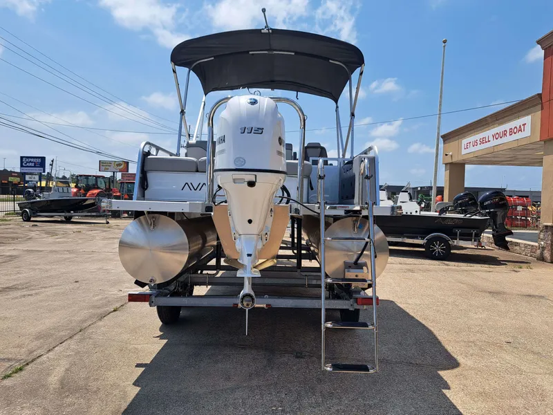 Slide: The Image of Rear view of Avalon VNT VRB21 pontoon boat, 2026 model, on a trailer. - 11