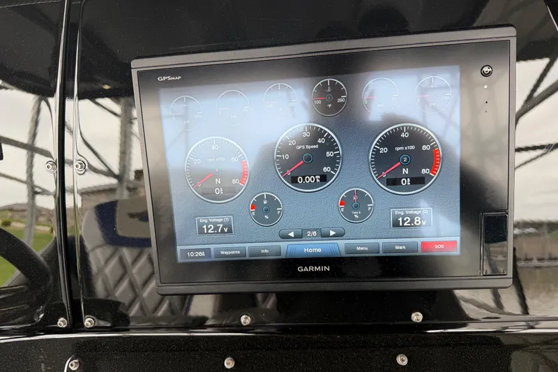 Slide: The Image of Garmin GPS display on 2018 Sunsation 32 CCX boat dashboard showing engine metrics. - 20