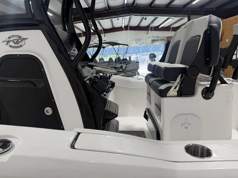 Slide: The Image of Interior view of the 2026 Tidewater 232 CC Adventure boat. - 16