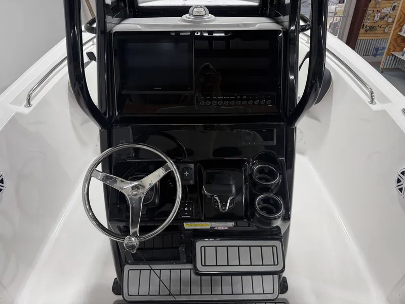 Slide: The Image of Helm console of the 2026 Tidewater 232 CC Adventure. - 23