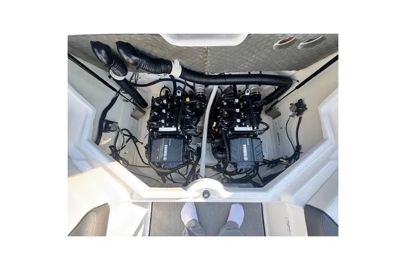 Slide: The Image of 2021 Yamaha AR 210 engine compartment with dual engines and wiring. - 32