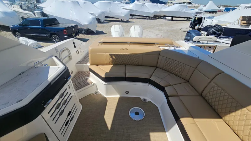 Slide: The Image of Interior of 2023 Sea Ray SLX 310 Outboard with luxurious seating. - 20