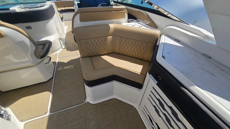 Slide: The Image of Interior of 2023 Sea Ray SLX 310 Outboard with luxurious seating. - 24