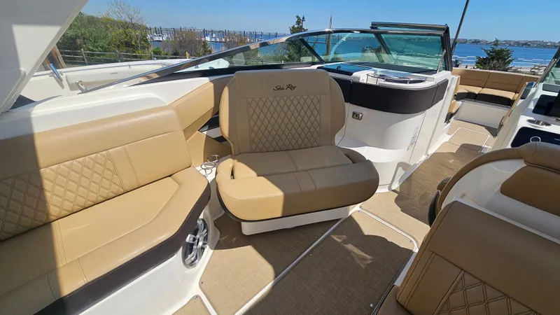 Slide: The Image of Interior of 2023 Sea Ray SLX 310 Outboard with luxurious seating. - 27