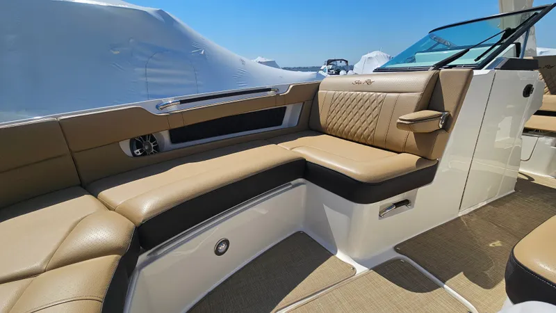 Slide: The Image of Luxurious seating in the 2023 Sea Ray SLX 310 Outboard boat. - 37