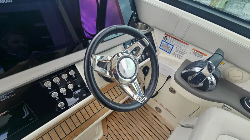 Slide: The Image of 2020 Sea Ray Sundancer 320 Outboard helm with modern design. - 16