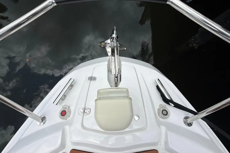 Slide: The Image of Bow view of 2025 NX Boats 340 Sport Coupe with anchor and fittings. - 62