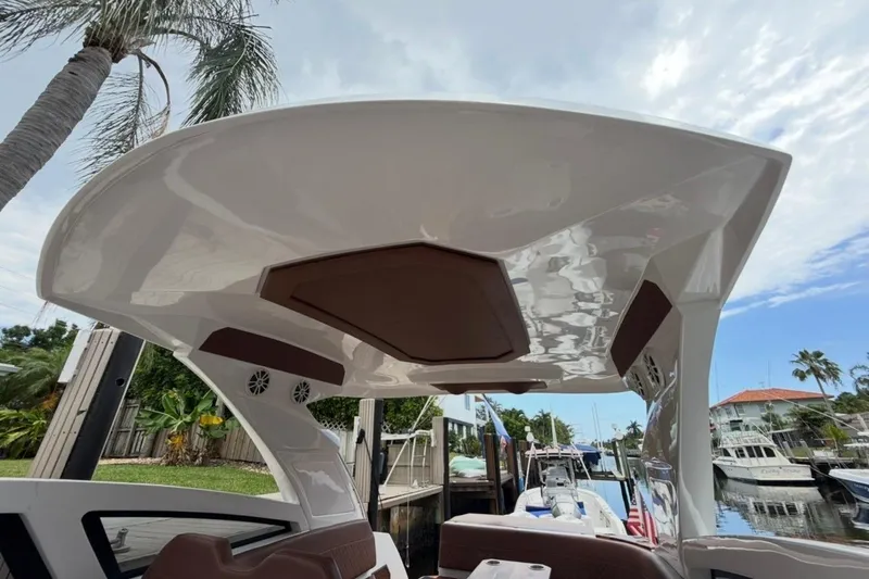 Slide: The Image of 2025 NX Boats 340 Sport Coupe interior view with sleek design and modern features. - 63