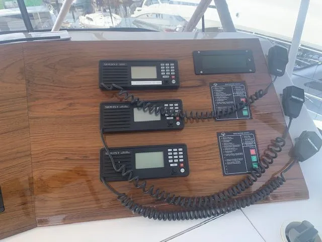 Slide: The Image of Control panel of a 2002 Viking 55 Convertible yacht with communication devices. - 8