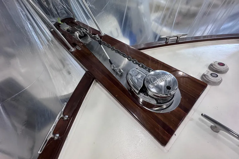 Slide: The Image of Anchor chain and winch on 1988 Ocean Yachts 48 Super Sport deck. - 47