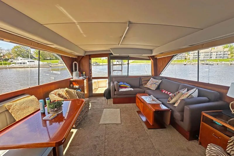 Slide: The Image of Luxurious interior of 1988 Ocean Yachts 48 Super Sport with spacious seating and elegant decor. - 9