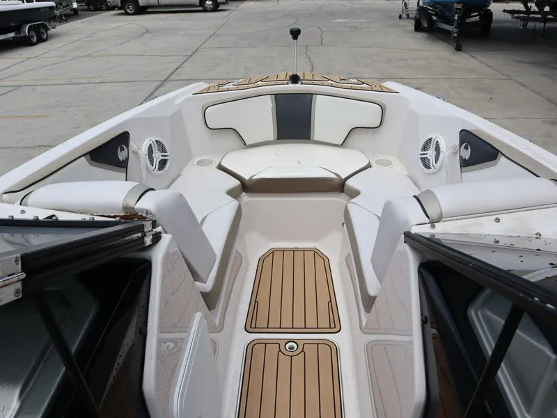 Slide: The Image of Interior of a 2014 Scarab 215 boat with seating area. - 14