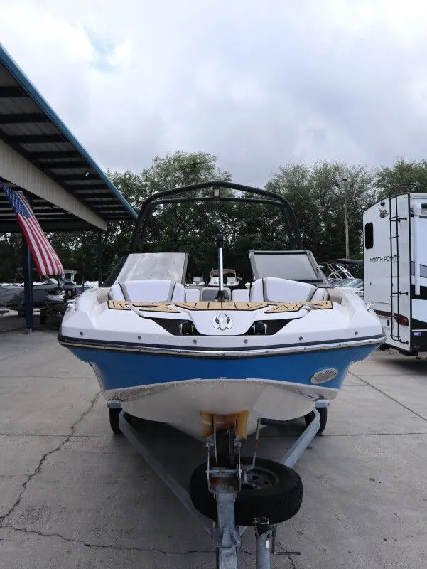 Slide: The Image of 2014 Scarab 215 boat on trailer, front view. - 3