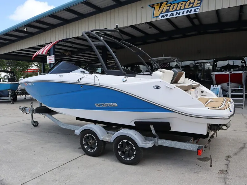 Slide: The Image of 2014 Scarab 215 boat on trailer at VForce Marine. - 8