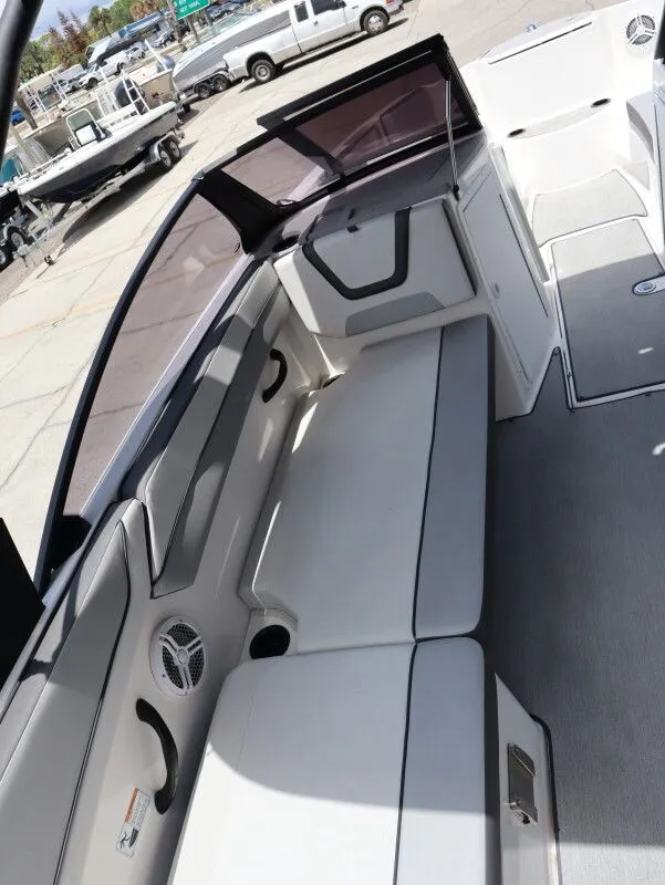 Slide: The Image of Interior of 2023 Yamaha Boats AR220 with seating area. - 11