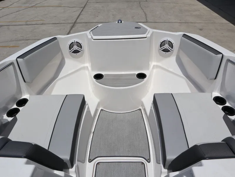 Slide: The Image of Interior of 2023 Yamaha Boats AR220 with seating and speakers. - 12