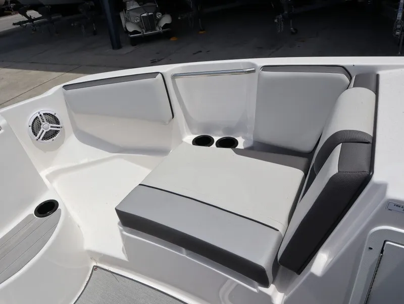 Slide: The Image of Interior of 2023 Yamaha Boats AR220 with seating area and speaker. - 14