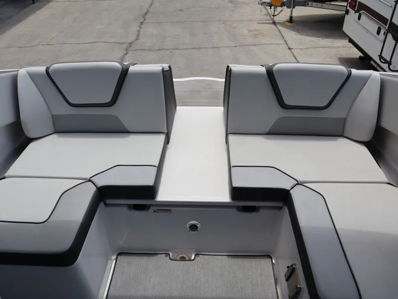 Slide: The Image of Interior of 2023 Yamaha AR220 boat with gray seating. - 20