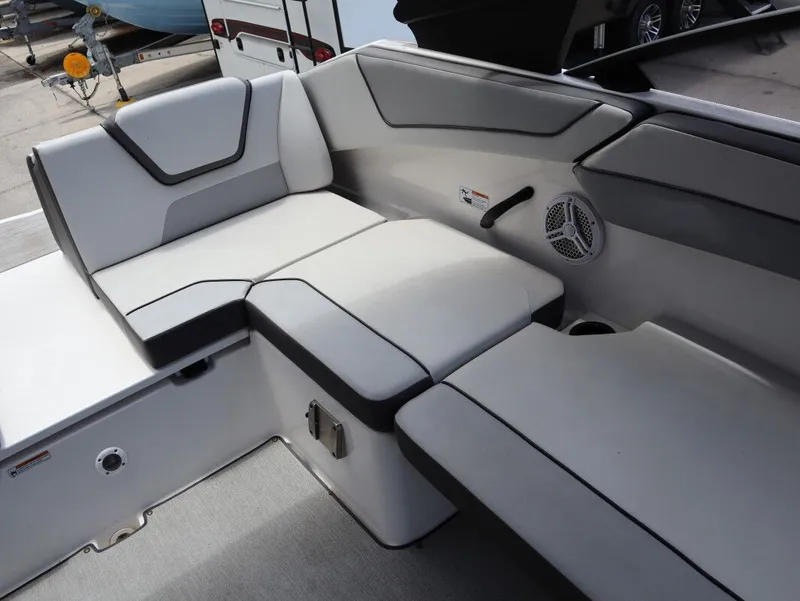 Slide: The Image of Interior of 2023 Yamaha AR220 boat with gray upholstery. - 21