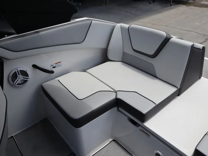 Slide: The Image of Interior of Yamaha AR220 boat, 2023 model, featuring gray upholstery. - 22
