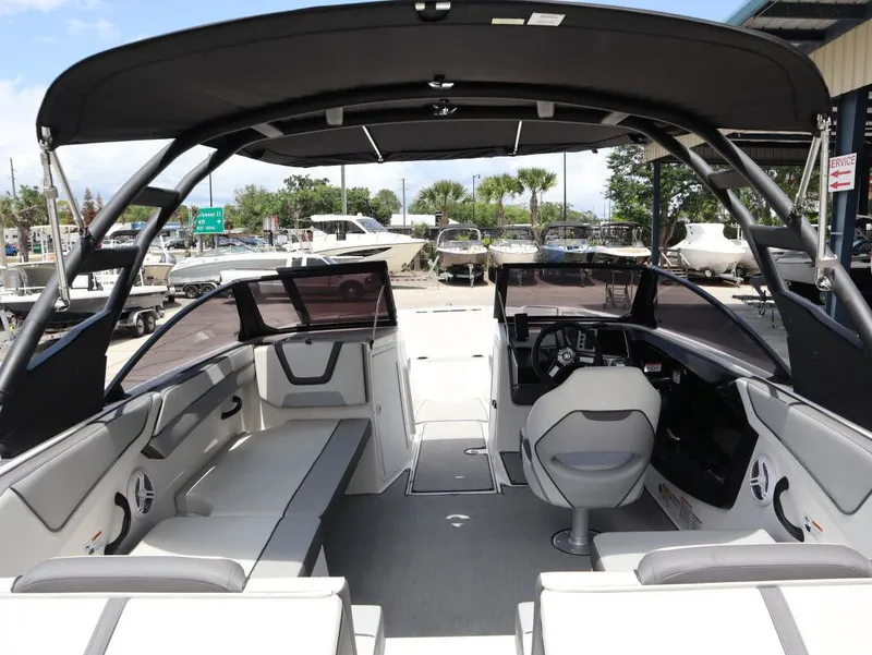 Slide: The Image of Interior view of 2023 Yamaha AR220 boat with modern features. - 9