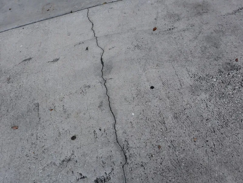 Slide: The Image of Crack in concrete surface, close-up, 1953 TDCM boat in background. - 15