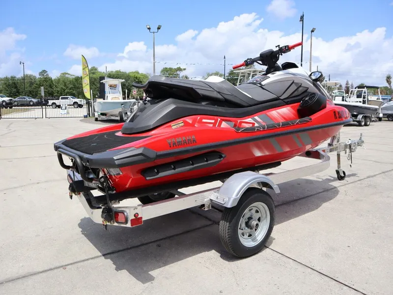 Slide: The Image of Red 2025 Yamaha GP 1900 HO jet ski on trailer. - 7