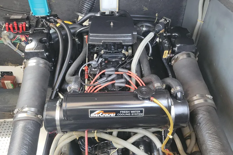 Slide: The Image of Engine compartment of a 1987 Sea Ray 390 Express with MerCruiser fresh water cooling system. - 19