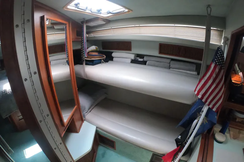 Slide: The Image of Engine compartment of a 1987 Sea Ray 390 Express with visible Kohler 7.4 generator. - 26