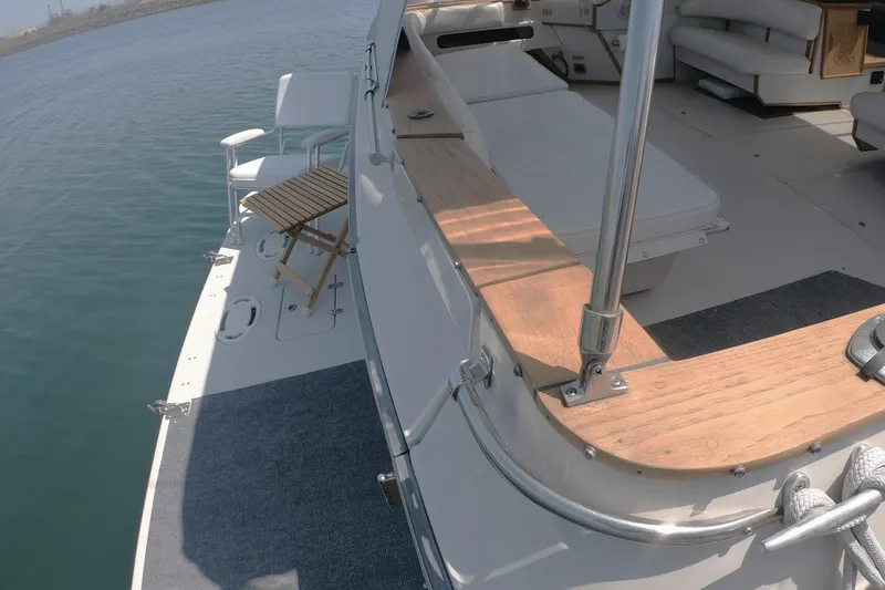 Slide: The Image of 1987 Sea Ray 390 Express beach Deck for easy water access. - 8
