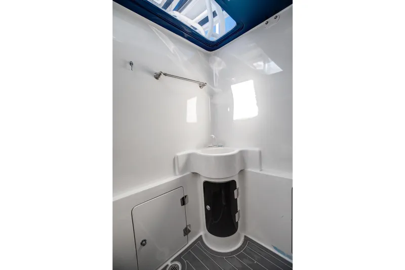 Slide: The Image of Compact bathroom interior of 2018 Hann 53 boat with modern fixtures and skylight. - 18