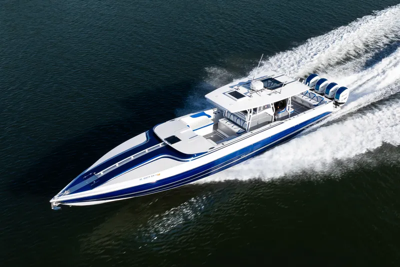 Slide: The Image of High-speed 2018 Hann 53 boat cruising on water with powerful engines. - 31