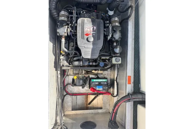 Slide: The Image of Engine compartment of a 2002 Bennington 2575RL I/O with Mercury 5.0 MPI engine. - 13