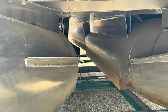 Slide: The Image of Underneath view of a 2002 Bennington 2575RL I/O pontoon boat. - 17