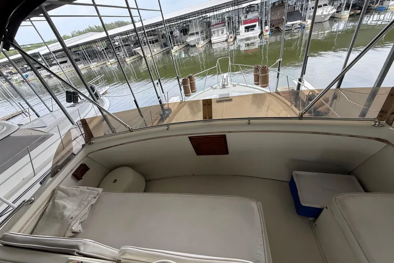 Slide: The Image of 1979 Viking 43 Double Cabin yacht interior with marina view. - 5