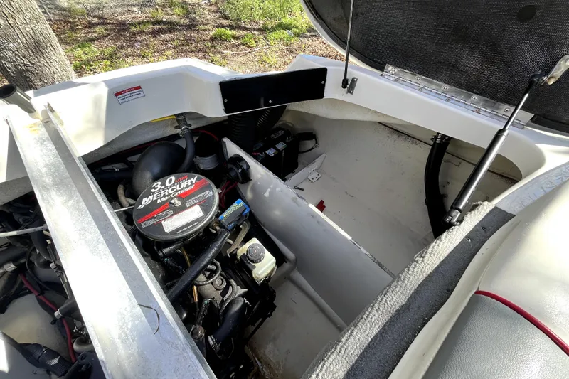 Slide: The Image of Engine compartment of a 2008 Sea Ray 185 Sport boat with Mercury MerCruiser engine. - 15