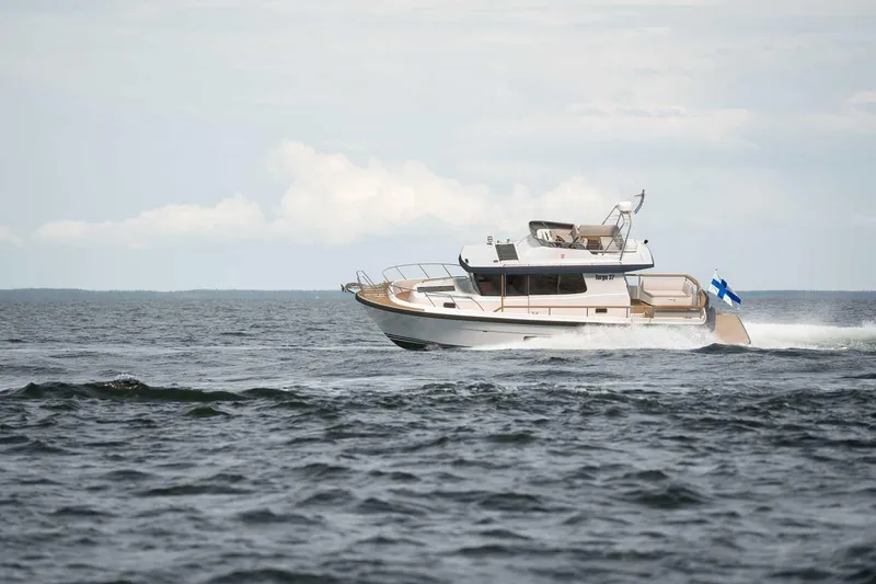 Slide: The Image of 2027 Targa TARGA 37 motor yacht cruising on open water. - 3