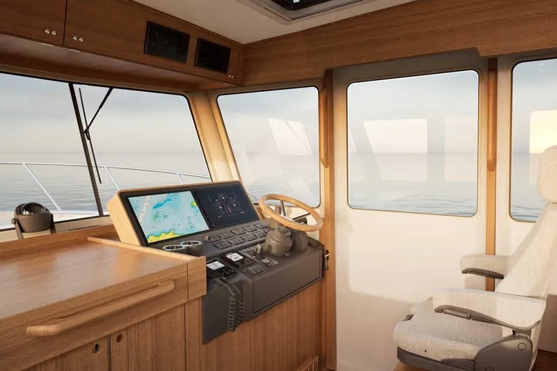 Slide: The Image of Interior of 2027 Targa TARGA 37 yacht with modern navigation system and wooden finish. - 9