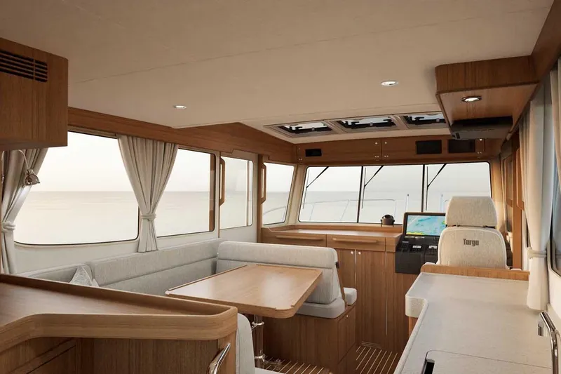 Slide: The Image of Luxurious interior of 2027 Targa TARGA 37 yacht with panoramic windows and elegant wood finish. - 5