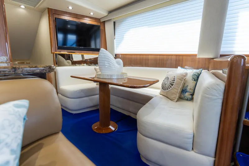 Slide: The Image of Luxurious interior of 2005 Viking 61 Enclosed Bridge yacht with plush seating and decor. - 35