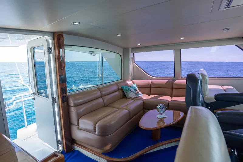 Slide: The Image of Luxurious interior of 2005 Viking 61 Enclosed Bridge yacht with ocean view. - 41