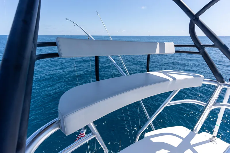 Slide: The Image of 2005 Viking 61 Enclosed Bridge yacht with ocean view and fishing rods. - 44