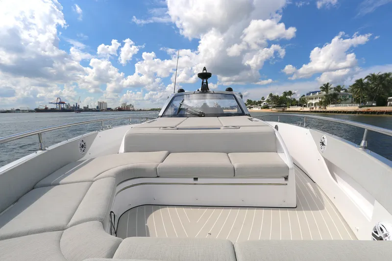 Slide: The Image of 2023 Azimut Verve 47 yacht with spacious deck, cruising on a sunny day. - 15
